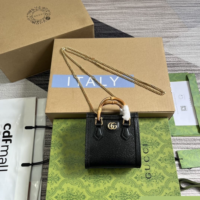 G*u*i top handle bags
